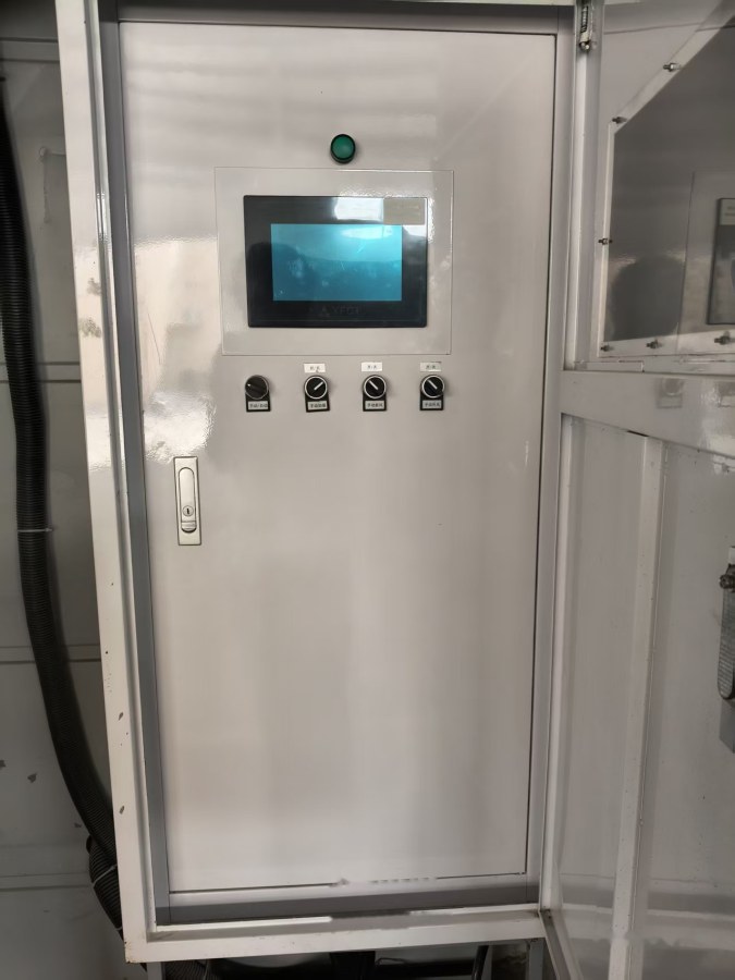 Main control cabinet exterior (touch screen and knob)